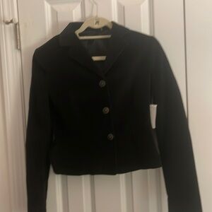Tahari coudoury black blazer never worn with tags . Size 4 runs small.